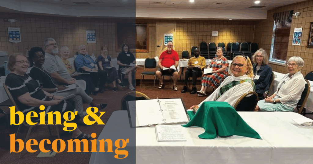 IMAGE DESCRIPTION: A group of people are sitting in a circle, but they're all turned to face the camera. An altar is set on a table in the foreground. Over the left side of the image is a semi-transparent dark blue color block. In a bold yellow and rich orange, text over the box reads, "being & becoming"