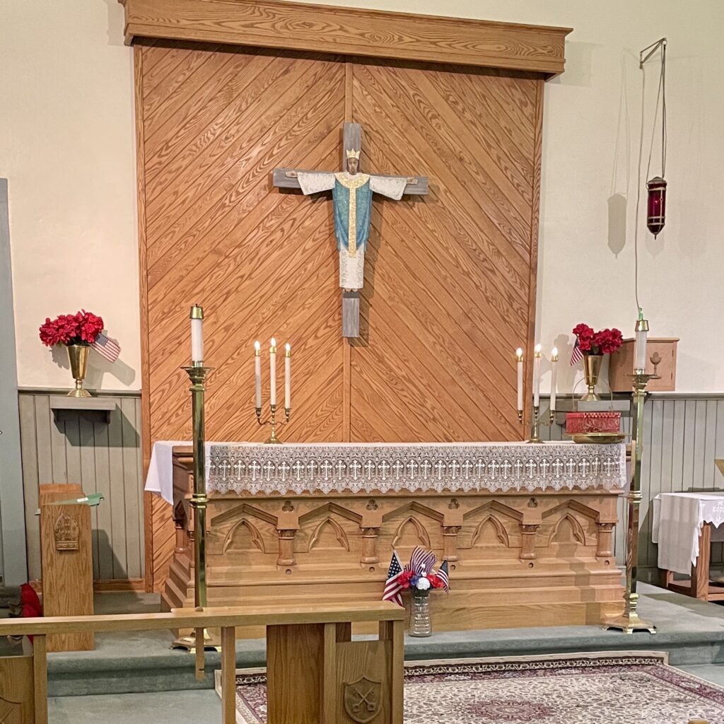 IMAGE DESCRIPTION: A picture of an altar with candles.
