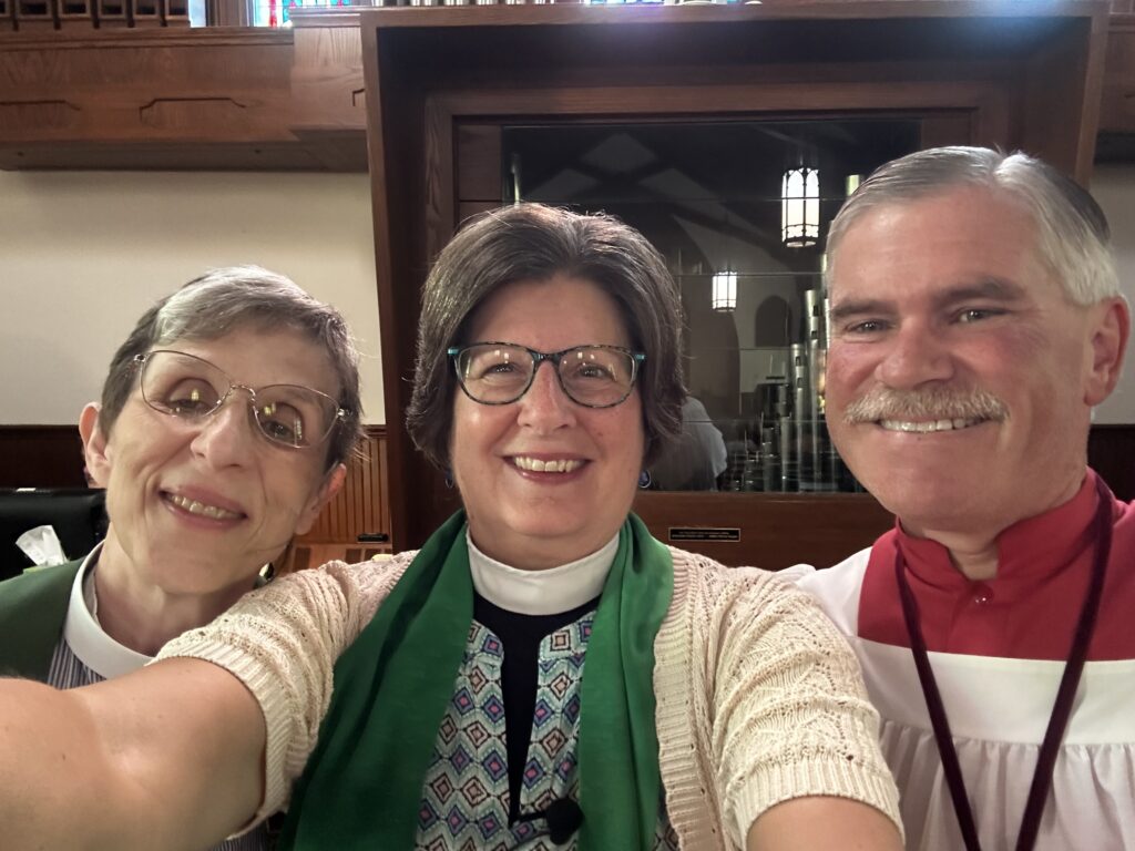 IMAGE DESCRIPTION: A selfie with Canon Little, Fr. Mary Shortt, and a choir member.